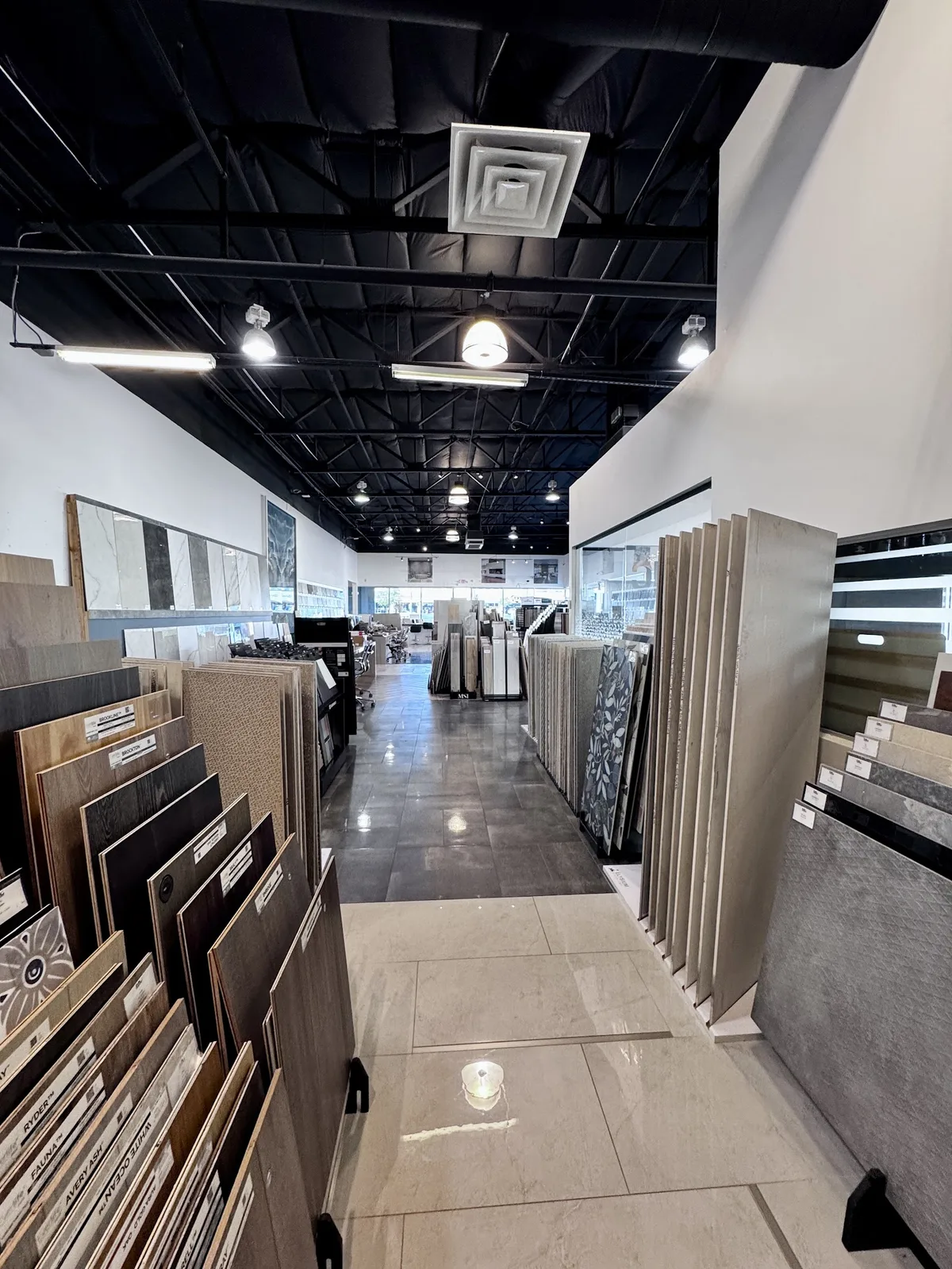 Flooring sample aisle inside the Modern Concepts Design showroom